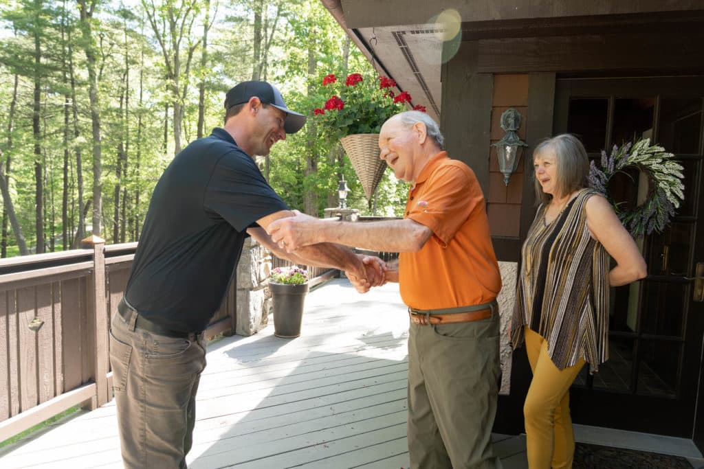 Georg shaking hands with customer