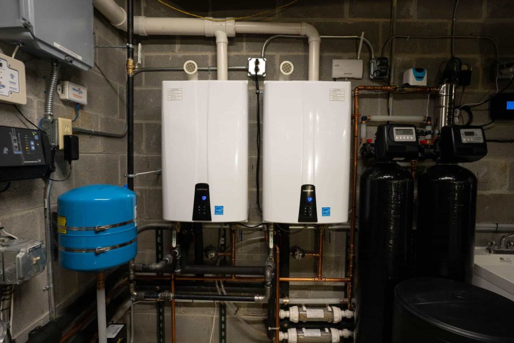 Tankless water heaters and filtration system